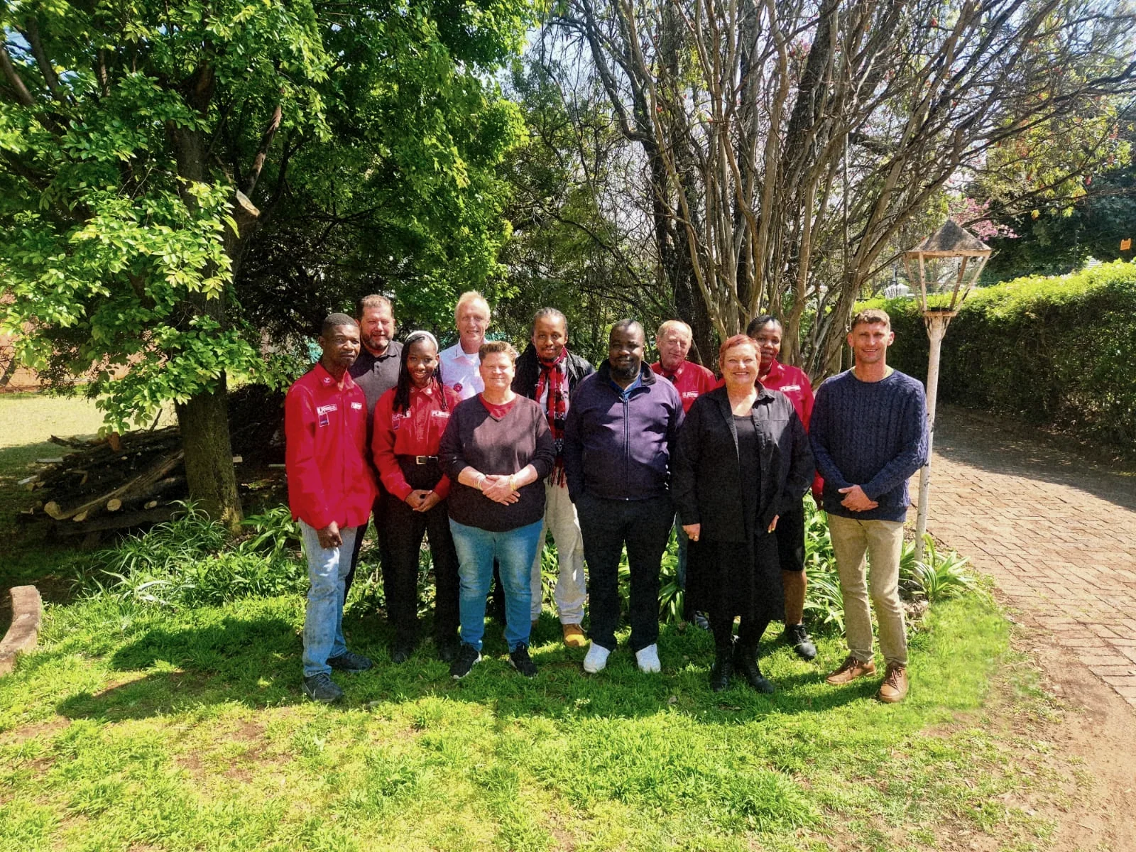 The Safe-T-Punch team standing together in a garden
