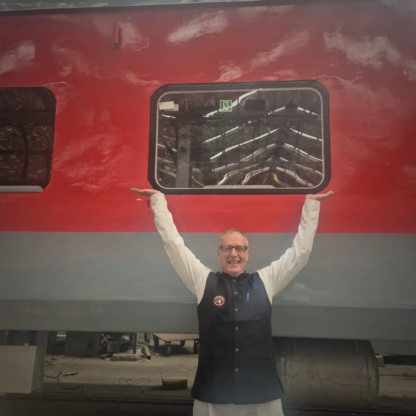 Ivan le Roux outside an LHB rail coach at the Rail Coach Factory, Kapurthala, India